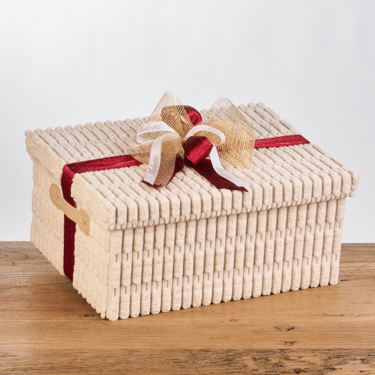 Fabric gift box containing Riso Melotti rice, sweet and savoury rice snacks, and rice beer.