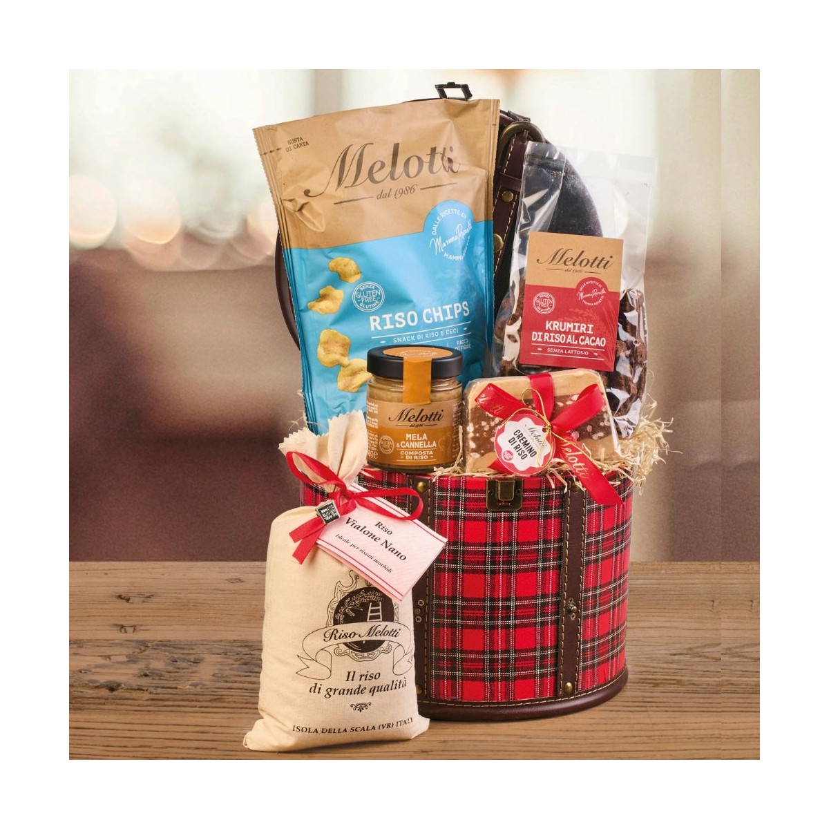 Beautiful Christmas beauty case featuring Vialone Nano rice and a selection of savoury and sweet Riso Melotti rice snacks.
