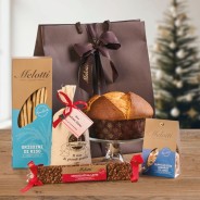 Melotti gift bag containing Vialone Nano Rice, rice snacks, and Riso Melotti Offella, a true Christmas classic.