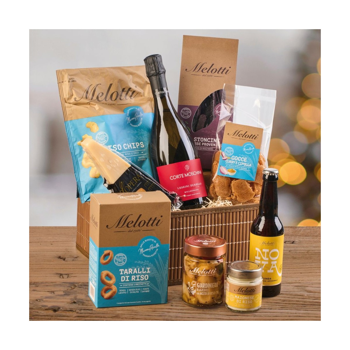 An original aperitif gift idea, featuring a selection of rice-based snacks, cheese, rice beer and wine. A special gift by Riso M