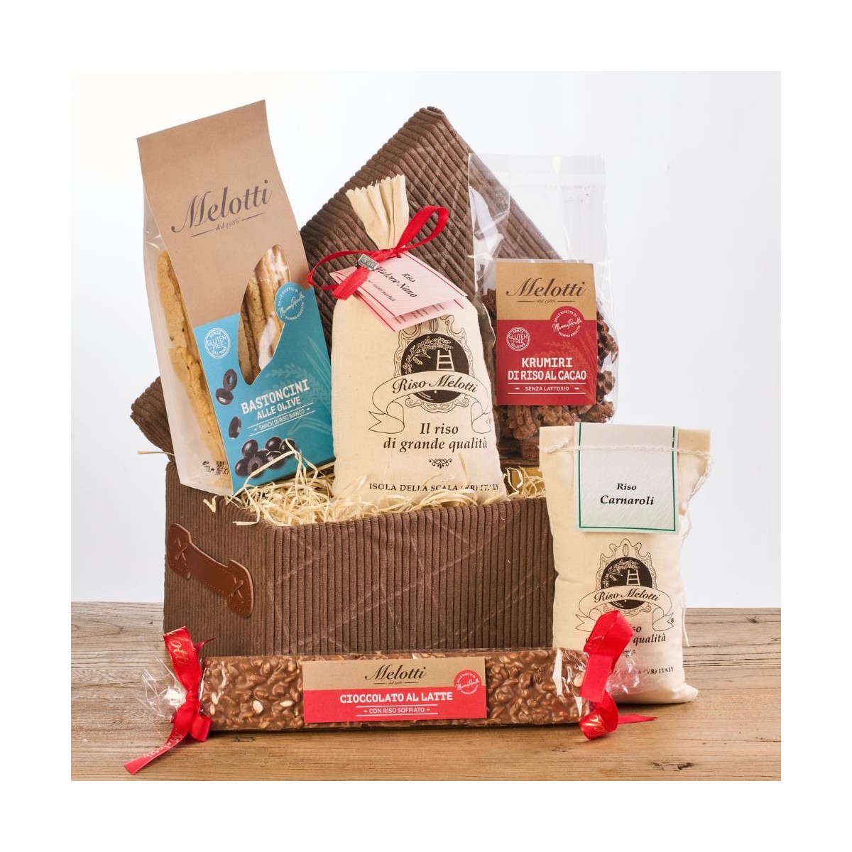 Scatola stoffa contenente riso Vialone Nano Melotti, Riso Carnaroli, snack dolce e salato. Idea regalo Natale